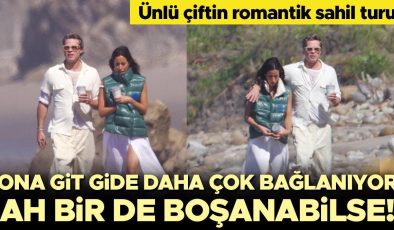 Ünlü çiftin romantik sahil turu… Her geçen gün ona biraz daha bağlanıyor… Ah bir de boşanabilse!